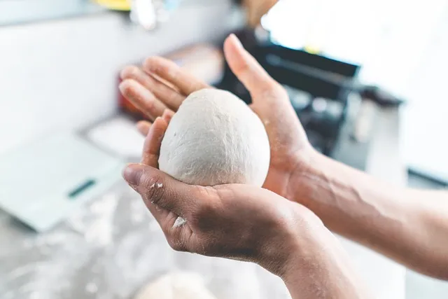 shaping pizza dough balls